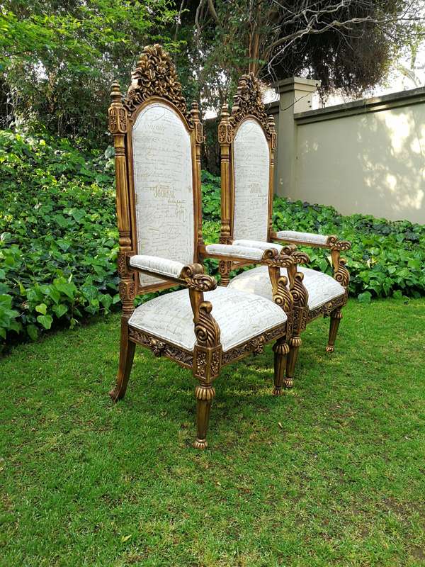 An Intricately Carved Pair of French Baroque/Rococo Style King/Throne Gold Painted Armchairs Upho...