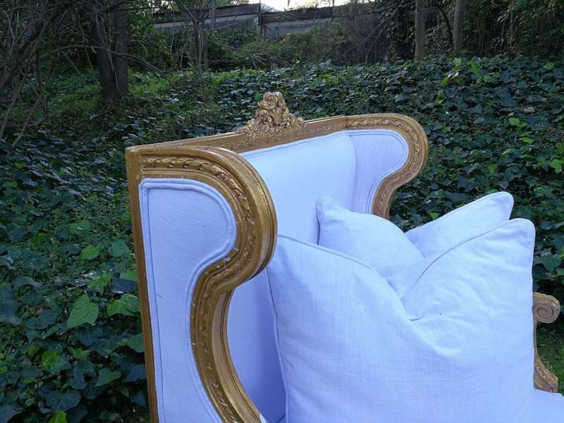 A Rare Carved and Gilded Daybed/Chaise in white upholstered