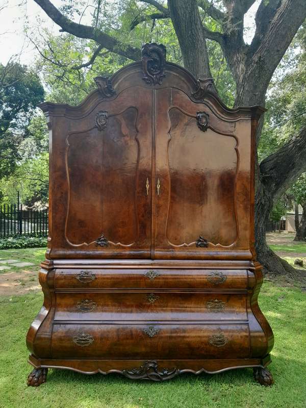 An 18th Century Dutch Ornately Carved Walnut Bombe Cabinet / Armoire With Original Handles and Locks