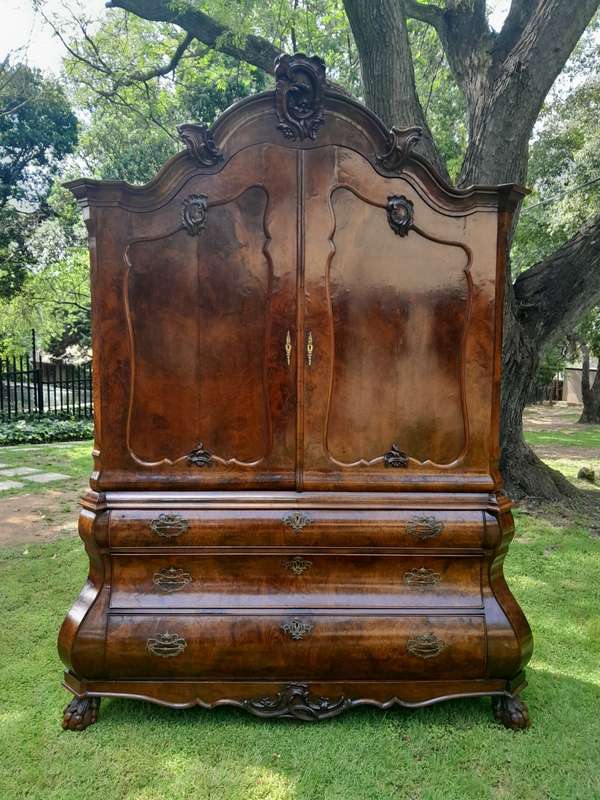 An 18th Century Dutch Ornately Carved Walnut Bombe Cabinet / Armoire With Original Handles and Locks