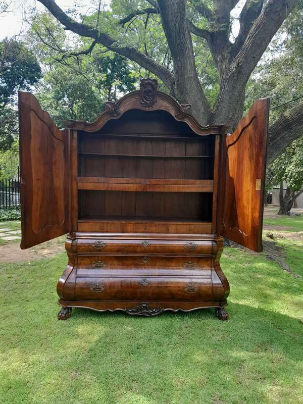 An 18th Century Dutch Ornately Carved Walnut Bombe Cabinet / Armoire With Original Handles and Locks
