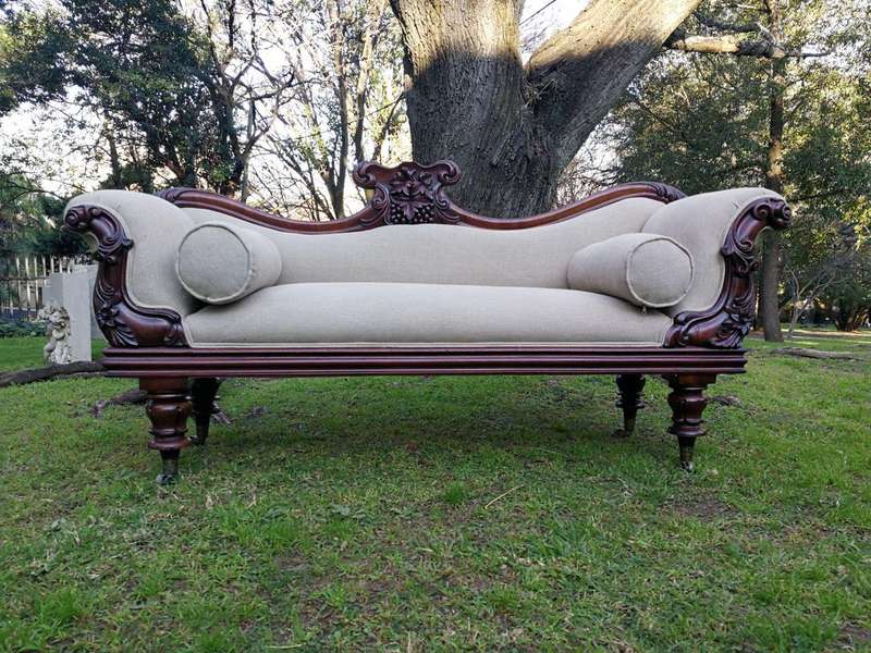 A Victorian Mahogany Settee In A Contemporary Wood Finish With Castors