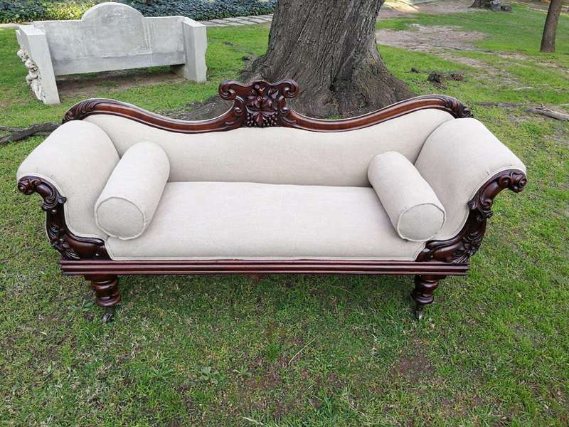 A Victorian Mahogany Settee In A Contemporary Wood Finish With Castors