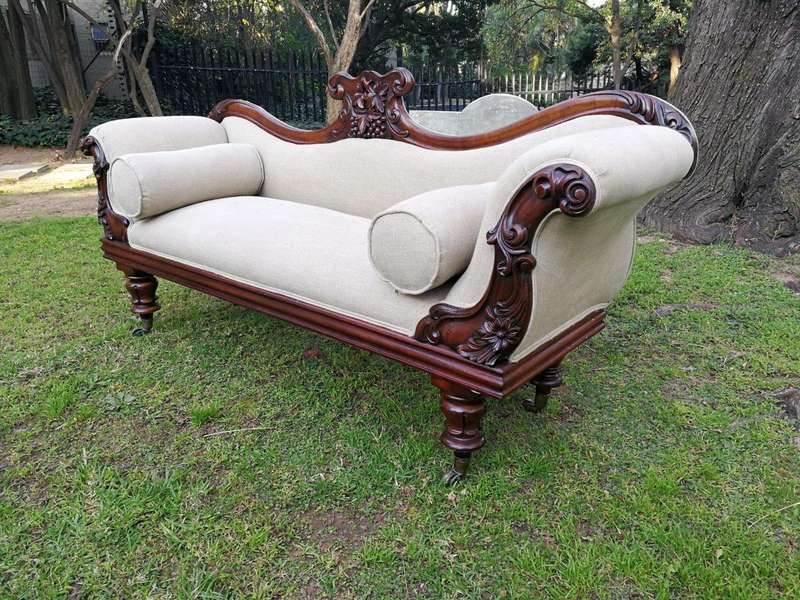 A Victorian Mahogany Settee In A Contemporary Wood Finish With Castors