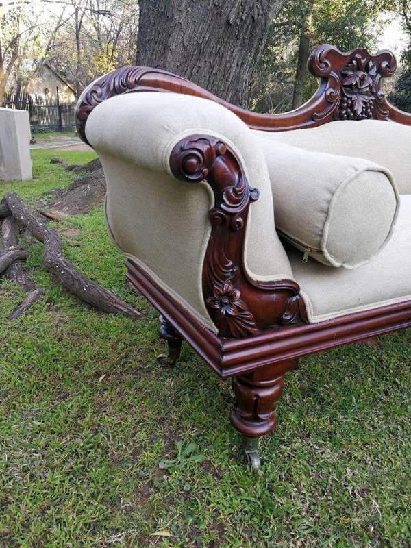 A Victorian Mahogany Settee In A Contemporary Wood Finish With Castors