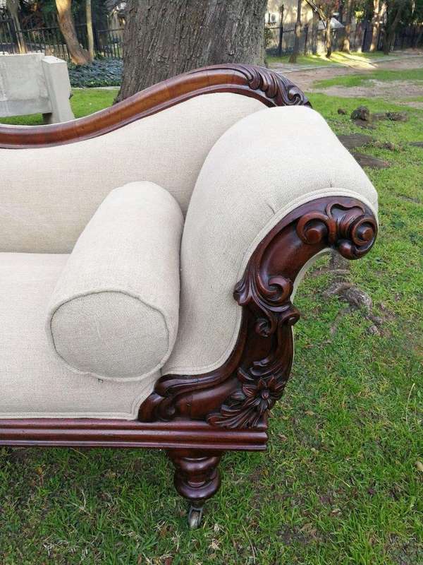 A Victorian Mahogany Settee In A Contemporary Wood Finish With Castors