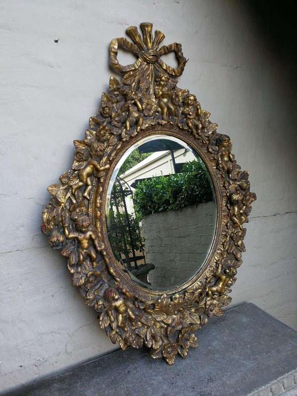 A Hand Gilded and Carved Bevelled Mirror