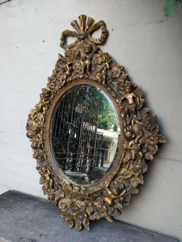 A Hand Gilded and Carved Bevelled Mirror