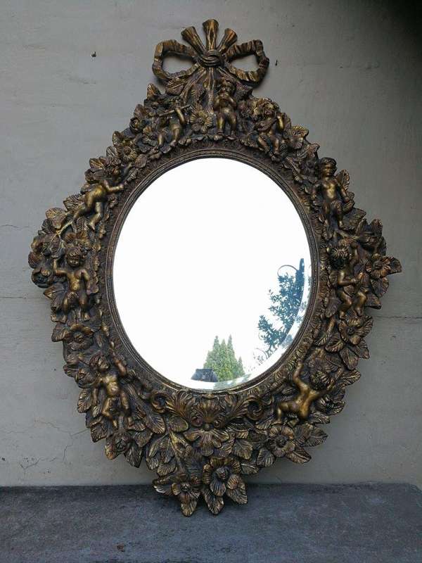A Hand Gilded and Carved Bevelled Mirror