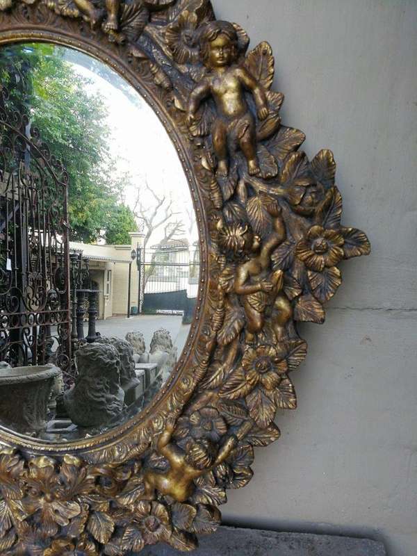 A Hand Gilded and Carved Bevelled Mirror