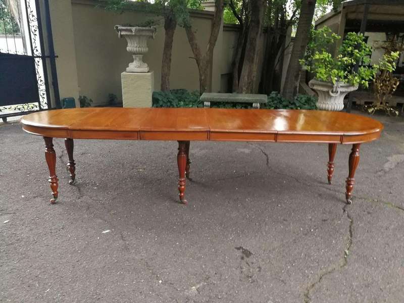 A 19th Century Victorian Style Teak Extending Dining Table
