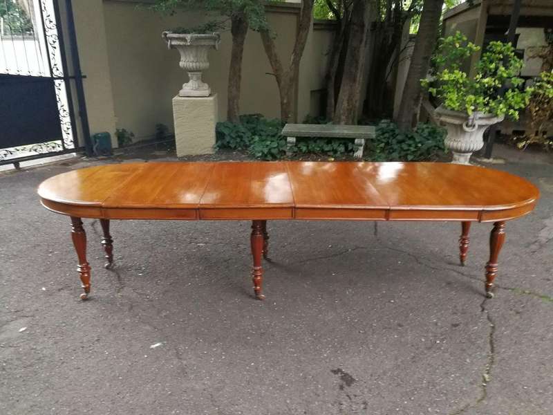 A 19th Century Victorian Style Teak Extending Dining Table
