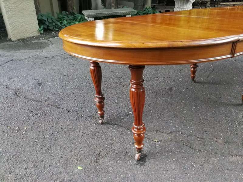A 19th Century Victorian Style Teak Extending Dining Table