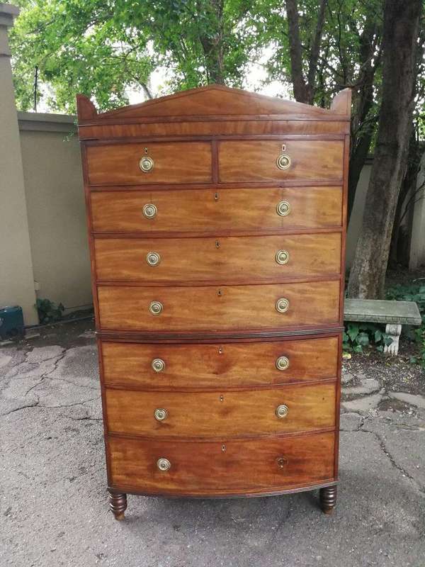 A Victorian Circa 1880, Mahogany Bow-front Chest-on-chest With Original Brass Escutcheons and Han...