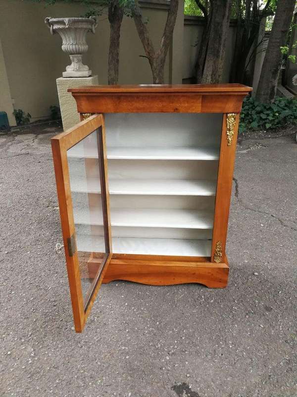 A Circa 1905 Victorian Walnut, Mahogany and Burr-walnut Pier Cabinet with Lock and Key