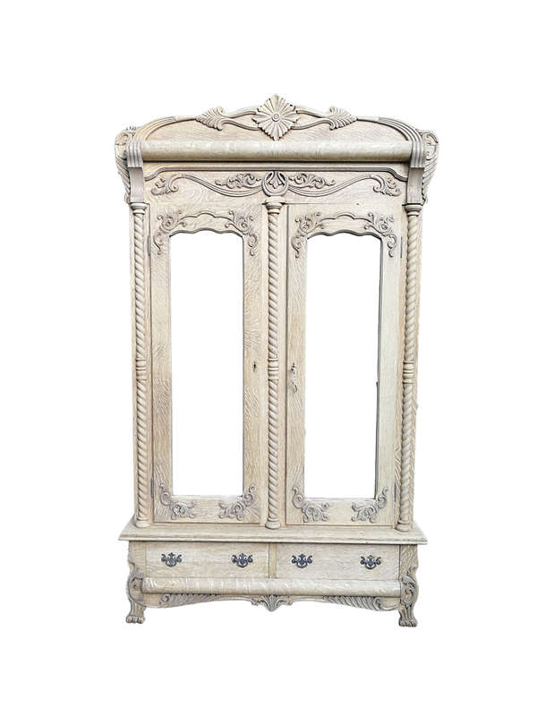 An Antique Victorian English Carved And Bleached Oak Armoire With Bevelled Mirror Doors And Two D...