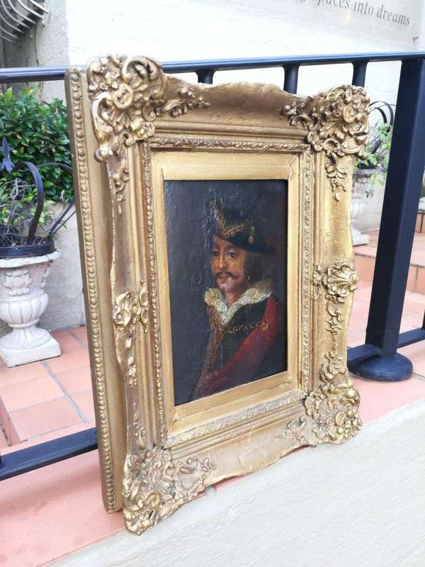 An Antique Oil on Board in an Antique Carved and Gilded Frame