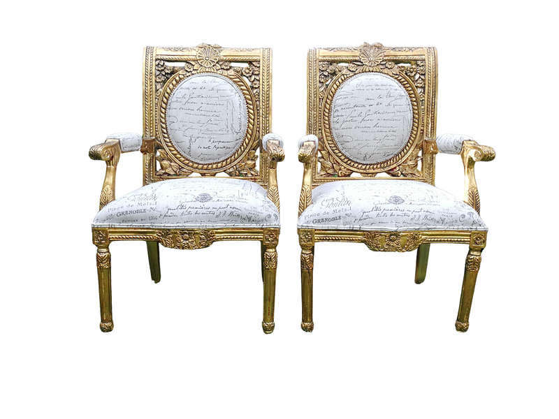 A 20TH Century Pair Of Ornately Carved And Hand Gilded French Style Armchairs Upholstered in a Cu...