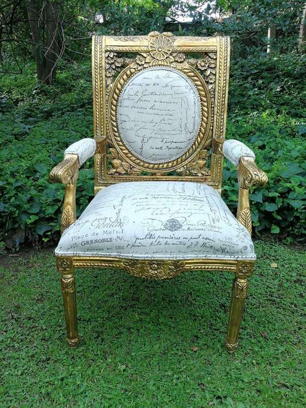 A 20TH Century Pair Of Ornately Carved And Hand Gilded French Style Armchairs Upholstered in a Cu...