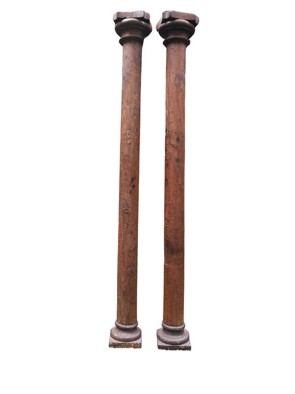 An Antique Pair Of Teak Pillars With Stone Bases