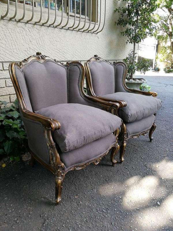 A 20th Century Pair Of French Style Hand Gilded Bergere/Wing-Back Armchairs Upholstered In An Imp...