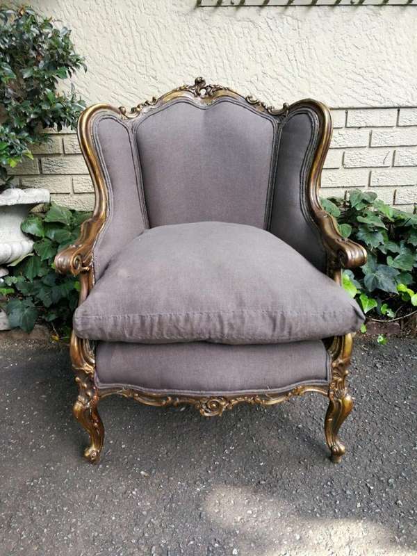 A 20th Century Pair Of French Style Hand Gilded Bergere/Wing-Back Armchairs Upholstered In An Imp...