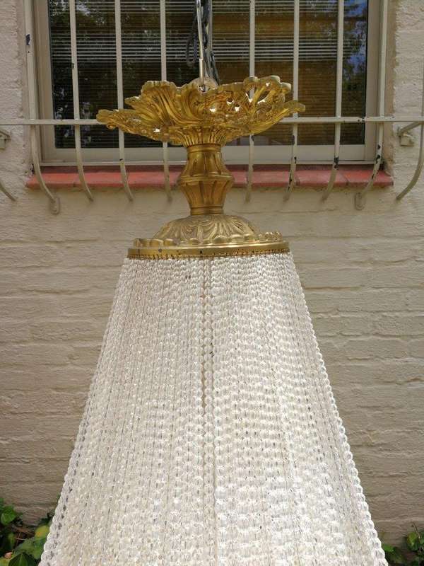 An Antique Gold Beaded Empire Style Chandelier