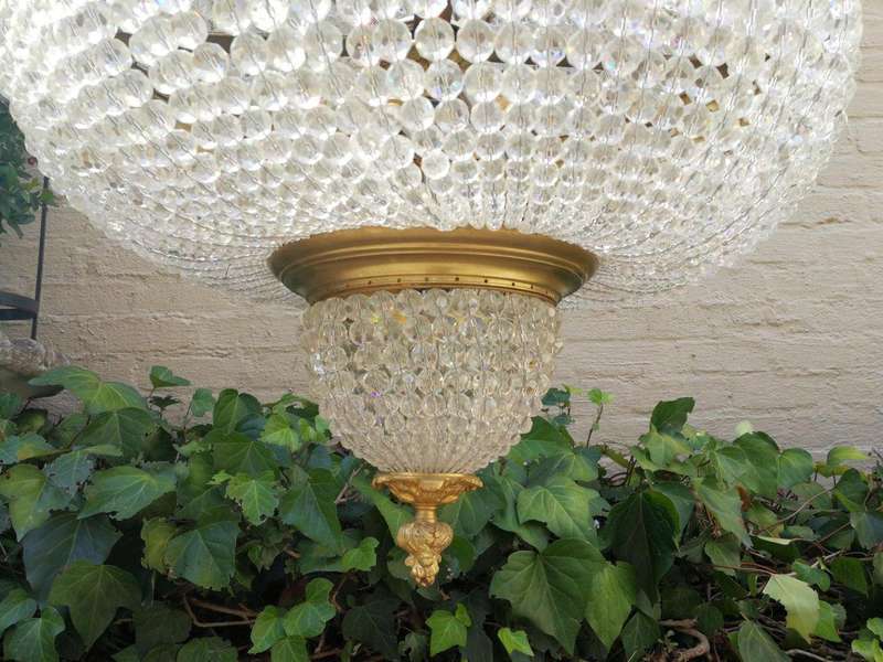 An Antique Gold Beaded Empire Style Chandelier