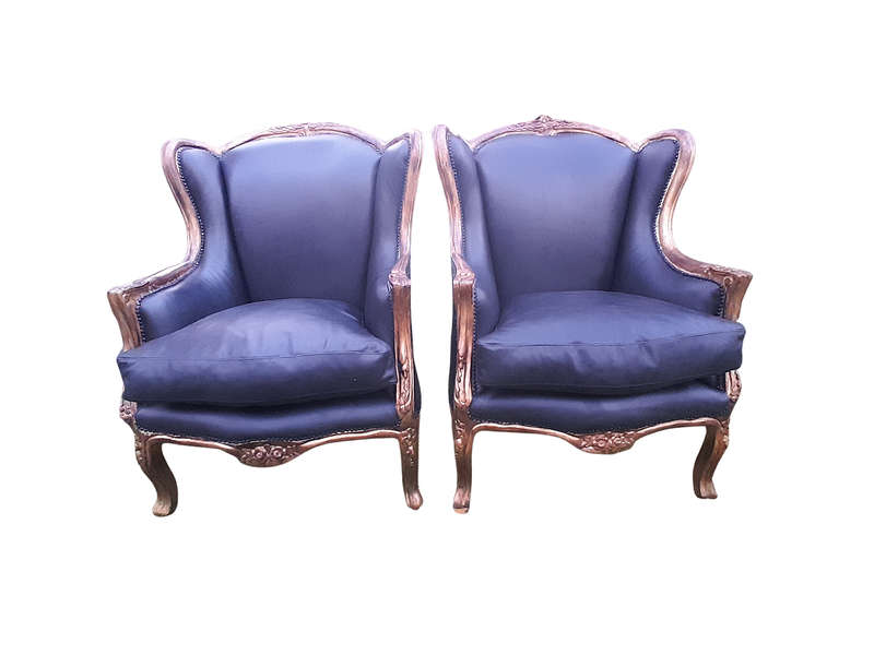 A Pair of French Style Hand Gilded Armchairs Upholstered in Leather