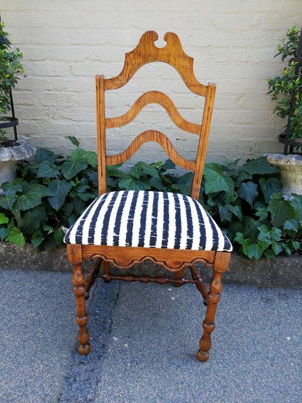 A Set Of Eight Carved Dining Chairs