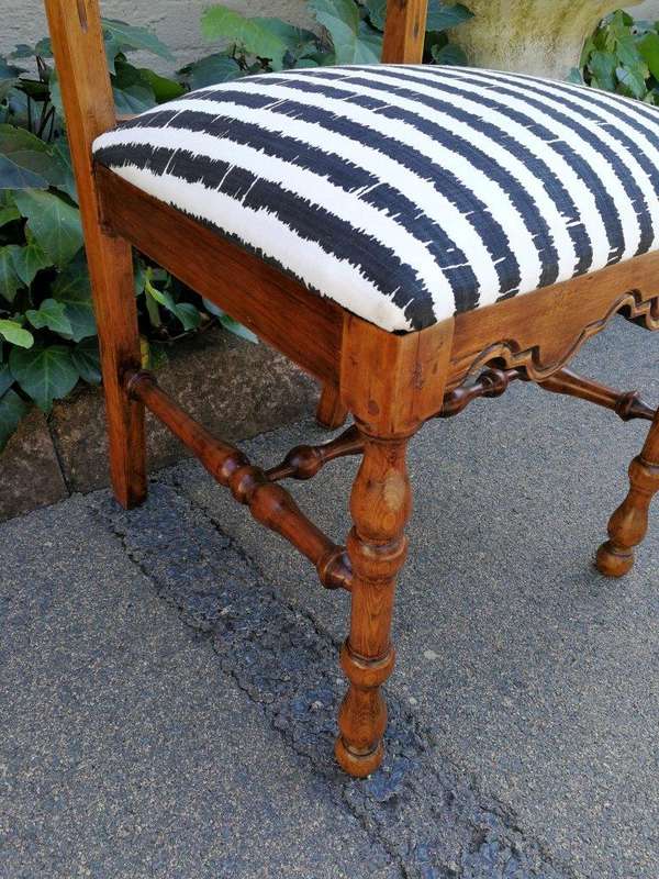 A Set Of Eight Carved Dining Chairs