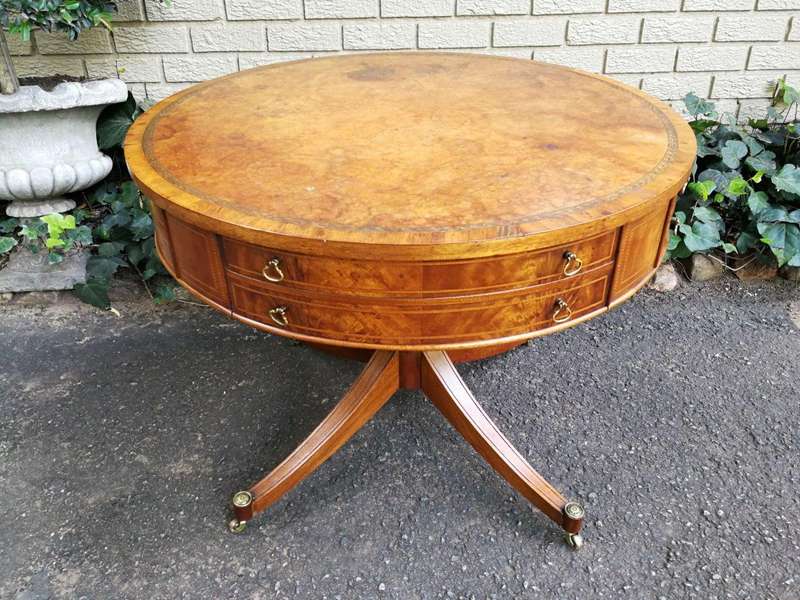 A Mid- 20th Century  (Circa 1950) Burr Walnut Drum Table With Tooled Leather Top and Drawers