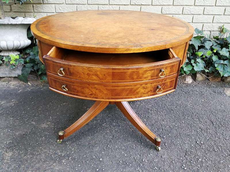 A Mid- 20th Century  (Circa 1950) Burr Walnut Drum Table With Tooled Leather Top and Drawers