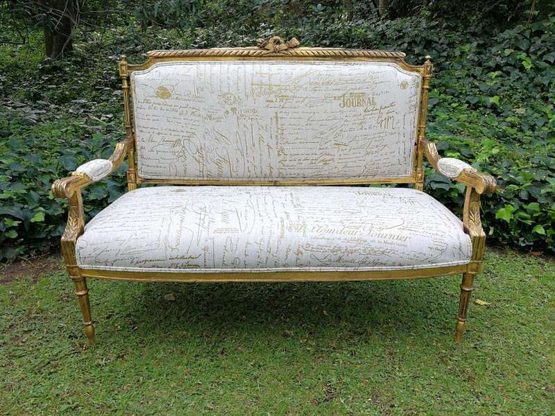 A French Style Hand-Gilded Beechwood Settee Upholstered In A Custom-Made Handmade Linen With Scri...