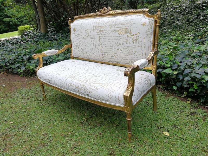 A French Style Hand-Gilded Beechwood Settee Upholstered In A Custom-Made Handmade Linen With Scri...