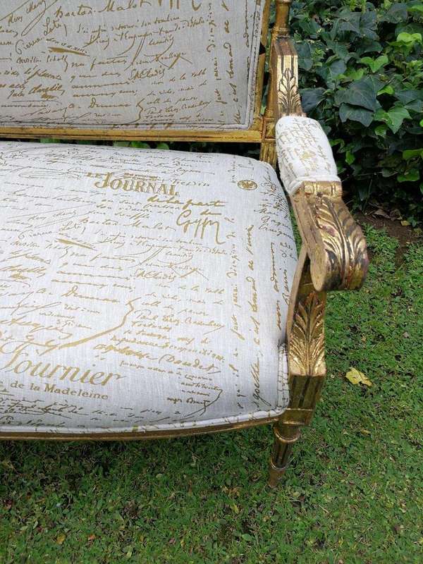 A French Style Hand-Gilded Beechwood Settee Upholstered In A Custom-Made Handmade Linen With Scri...