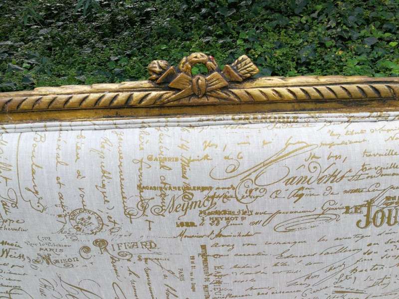 A French Style Hand-Gilded Beechwood Settee Upholstered In A Custom-Made Handmade Linen With Scri...
