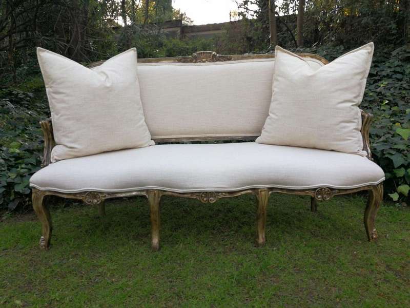 A 20th Century Carved And Hand-Gilded French Style Settee Upholstered In An Imported Linen