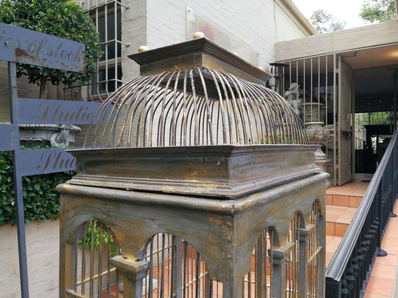 A 20th Century Decorative Metal And Wood Birdcage