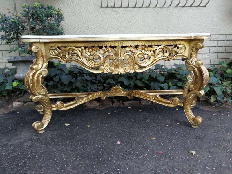 A 20th Century Hand-Gilded Ornately Carved Wooden Console/Entrance Table Of Large Proportion