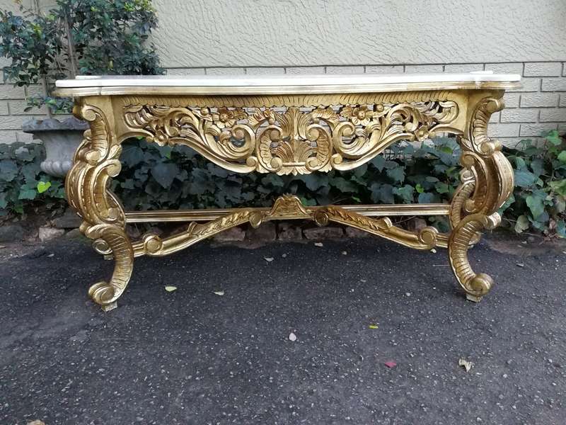 A 20th Century Hand-Gilded Ornately Carved Wooden Console/Entrance Table Of Large Proportion