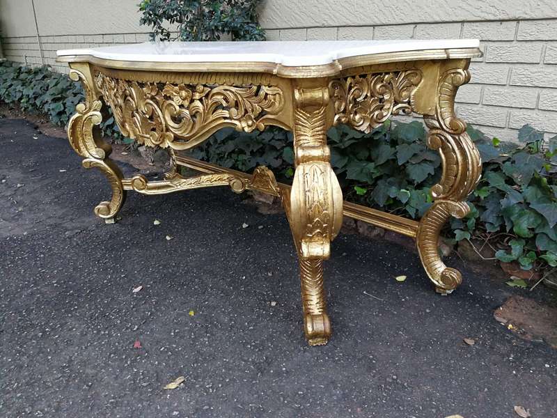 A 20th Century Hand-Gilded Ornately Carved Wooden Console/Entrance Table Of Large Proportion