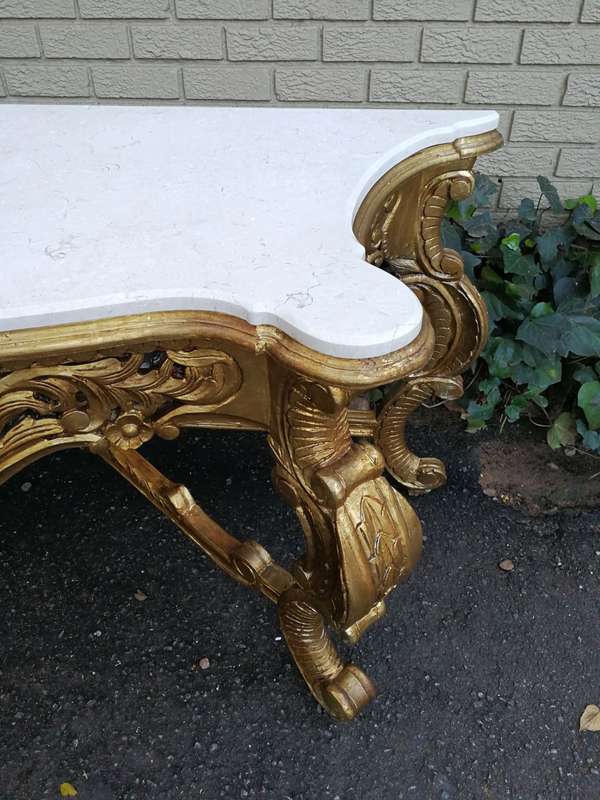 A 20th Century Hand-Gilded Ornately Carved Wooden Console/Entrance Table Of Large Proportion