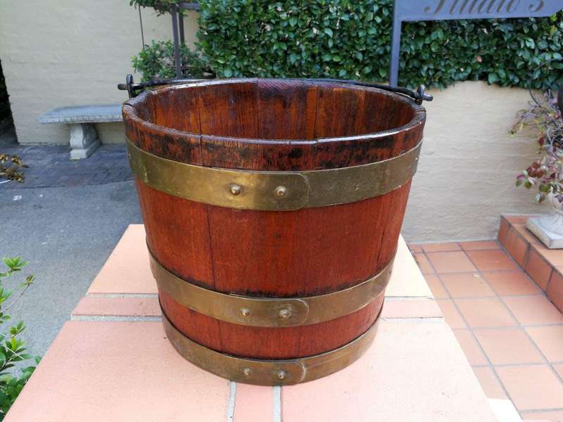 A 20th Century Teak Water Bucket with Brand Bands and Iron Handle ND