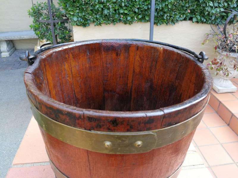 A 20th Century Teak Water Bucket with Brand Bands and Iron Handle ND