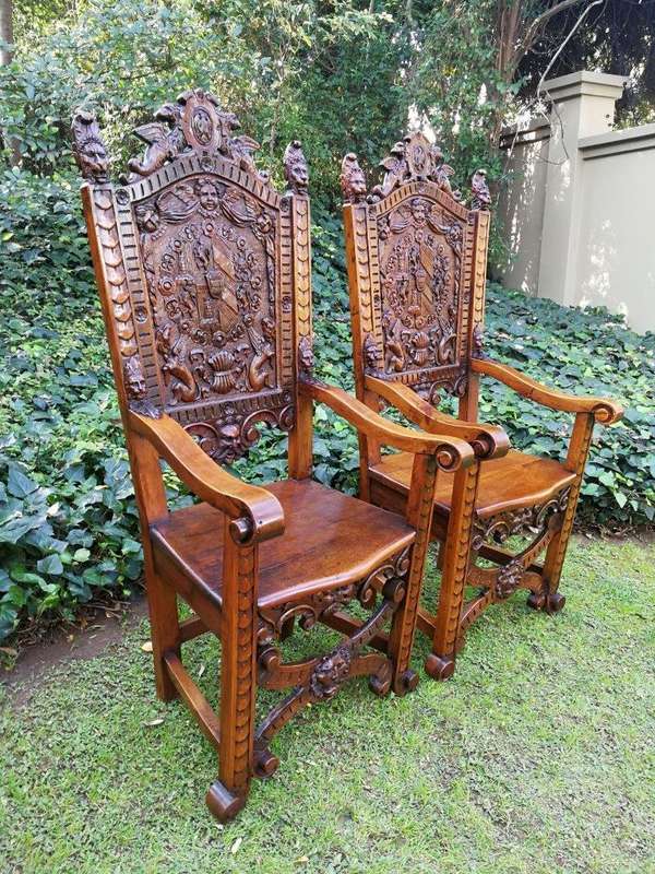 A Pair of Carved Continental Throne / King Chairs