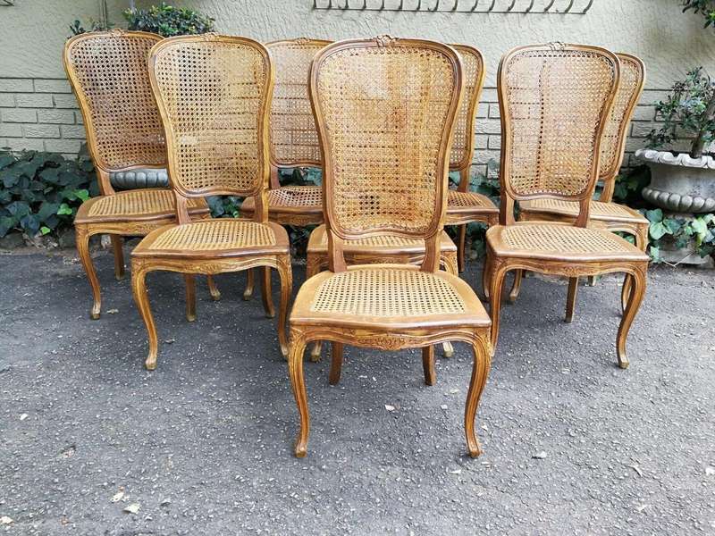A 20th Century Circa Mid 1950s Set Of Eight French Carved Oak Dining Chairs