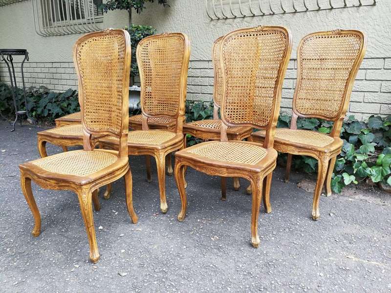 A 20th Century Circa Mid 1950s Set Of Eight French Carved Oak Dining Chairs