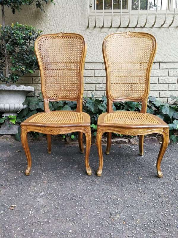 A 20th Century Circa Mid 1950s Set Of Eight French Carved Oak Dining Chairs