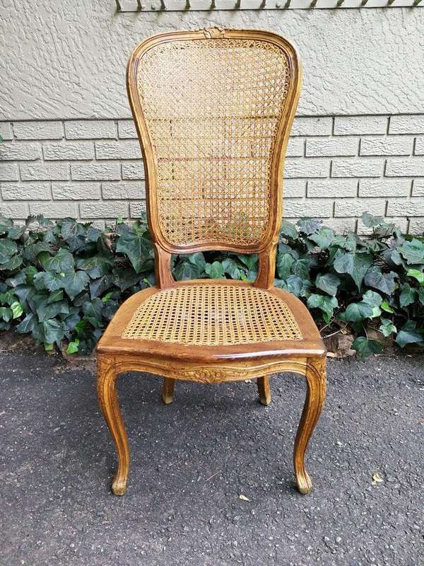 A 20th Century Circa Mid 1950s Set Of Eight French Carved Oak Dining Chairs